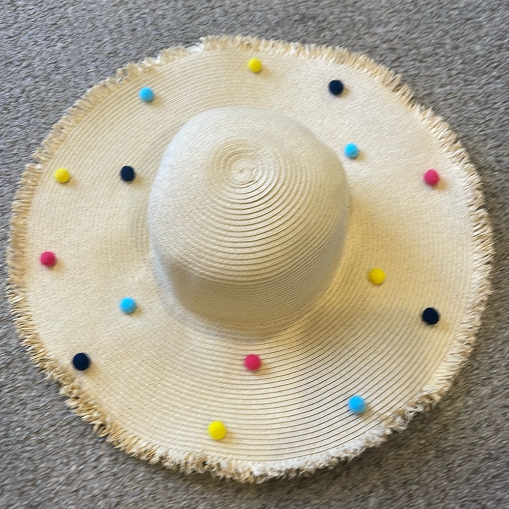 Shiraleah floppy beach hat with Pom poms.